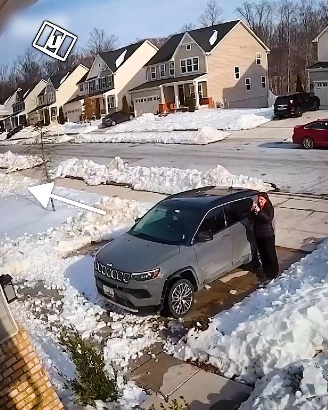 Melting Roof Snow Aims for Parked Car