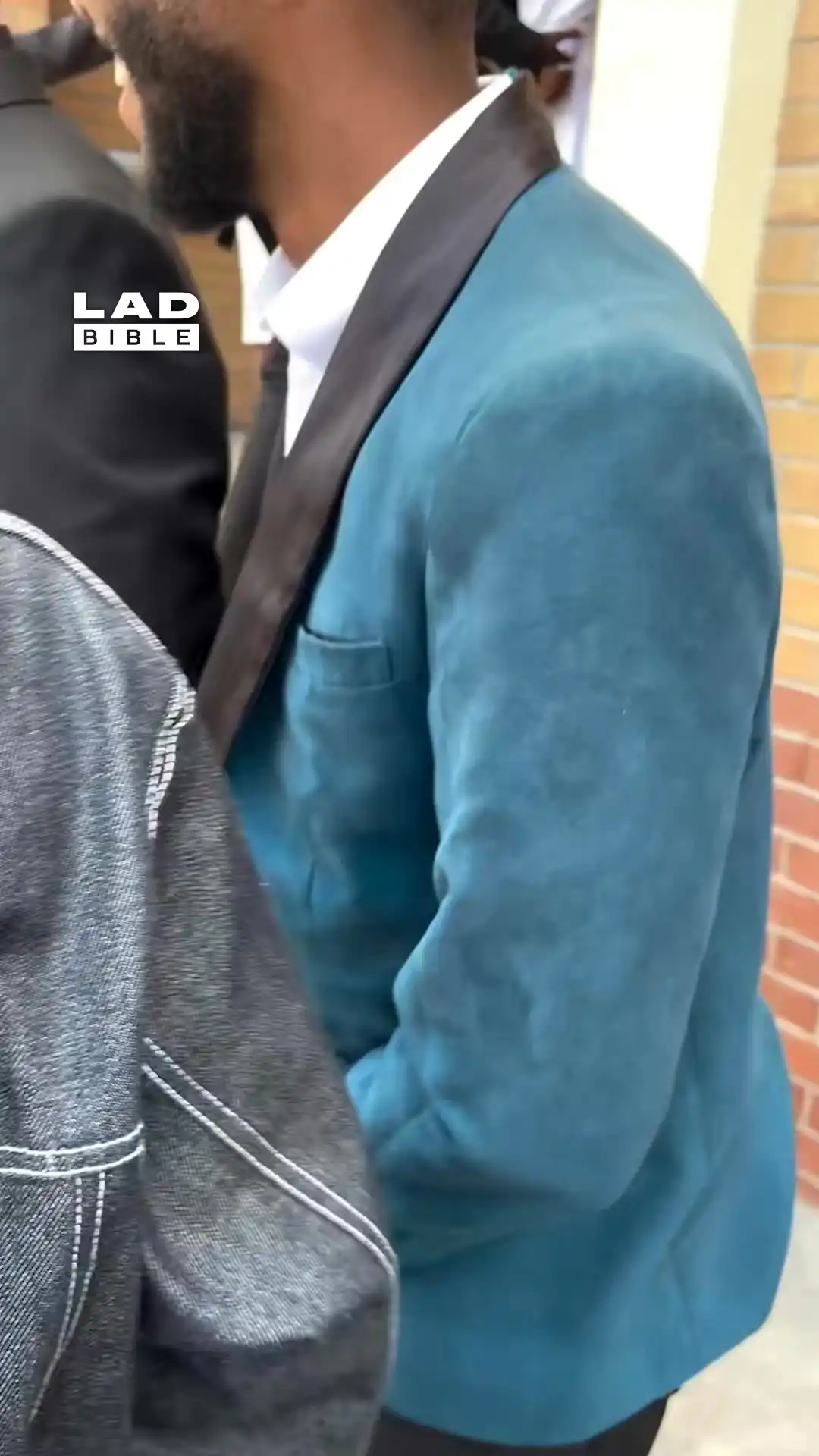 Lad wears his old work shirt to a party 😅