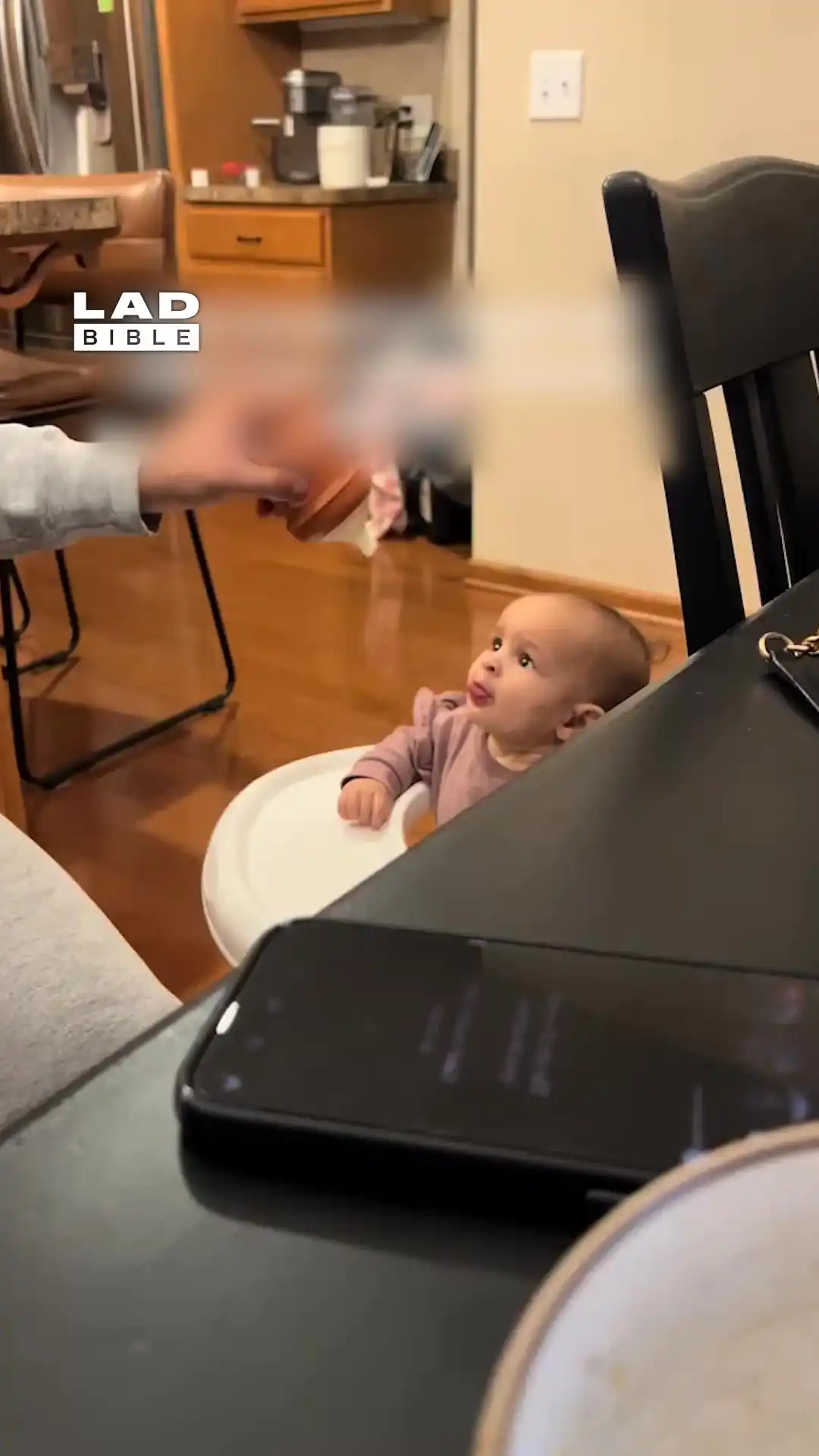 This dad's bottle feeding technique is questionable 🤨
