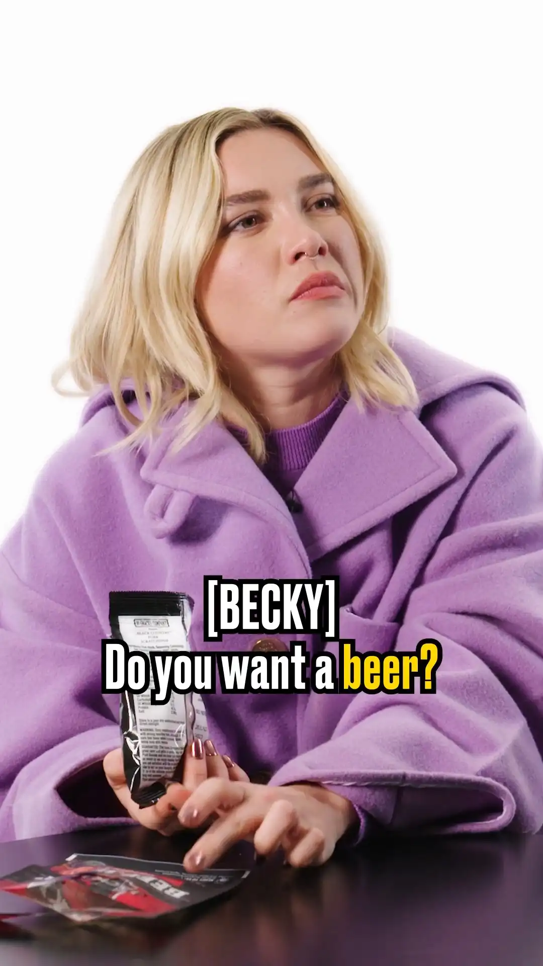 Florence Pugh drinking beer and eating pub snacks