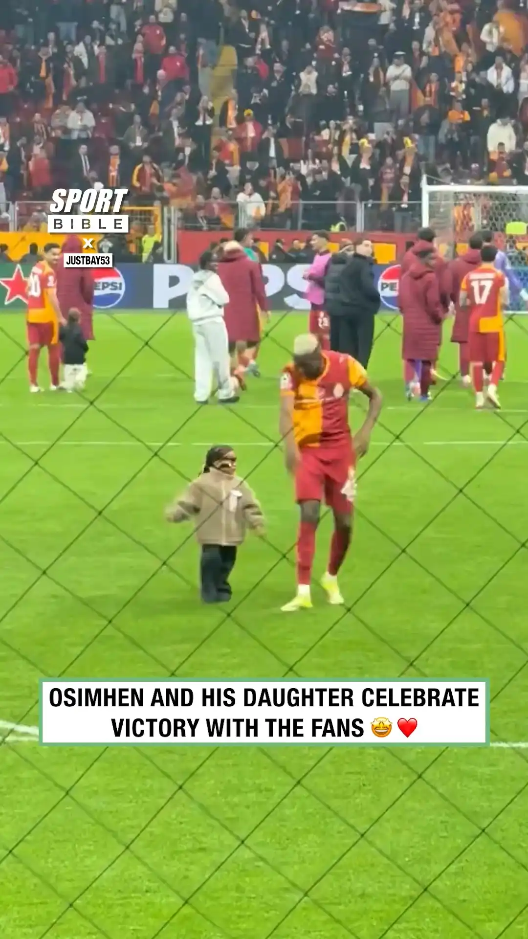 Osimhen and his daughter celebrate win with the fans ❤️