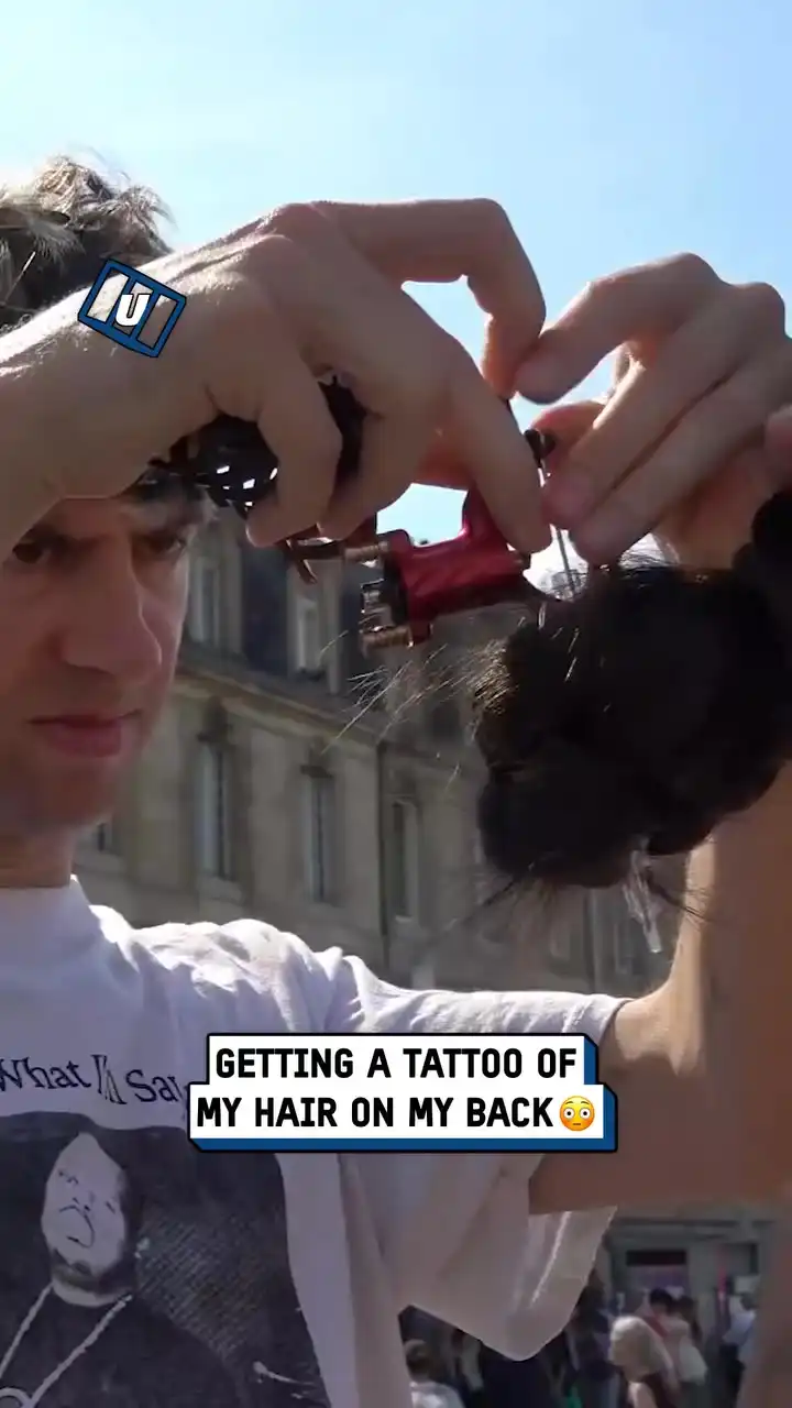 Getting tattooed by her own hair 😱💇‍♀️