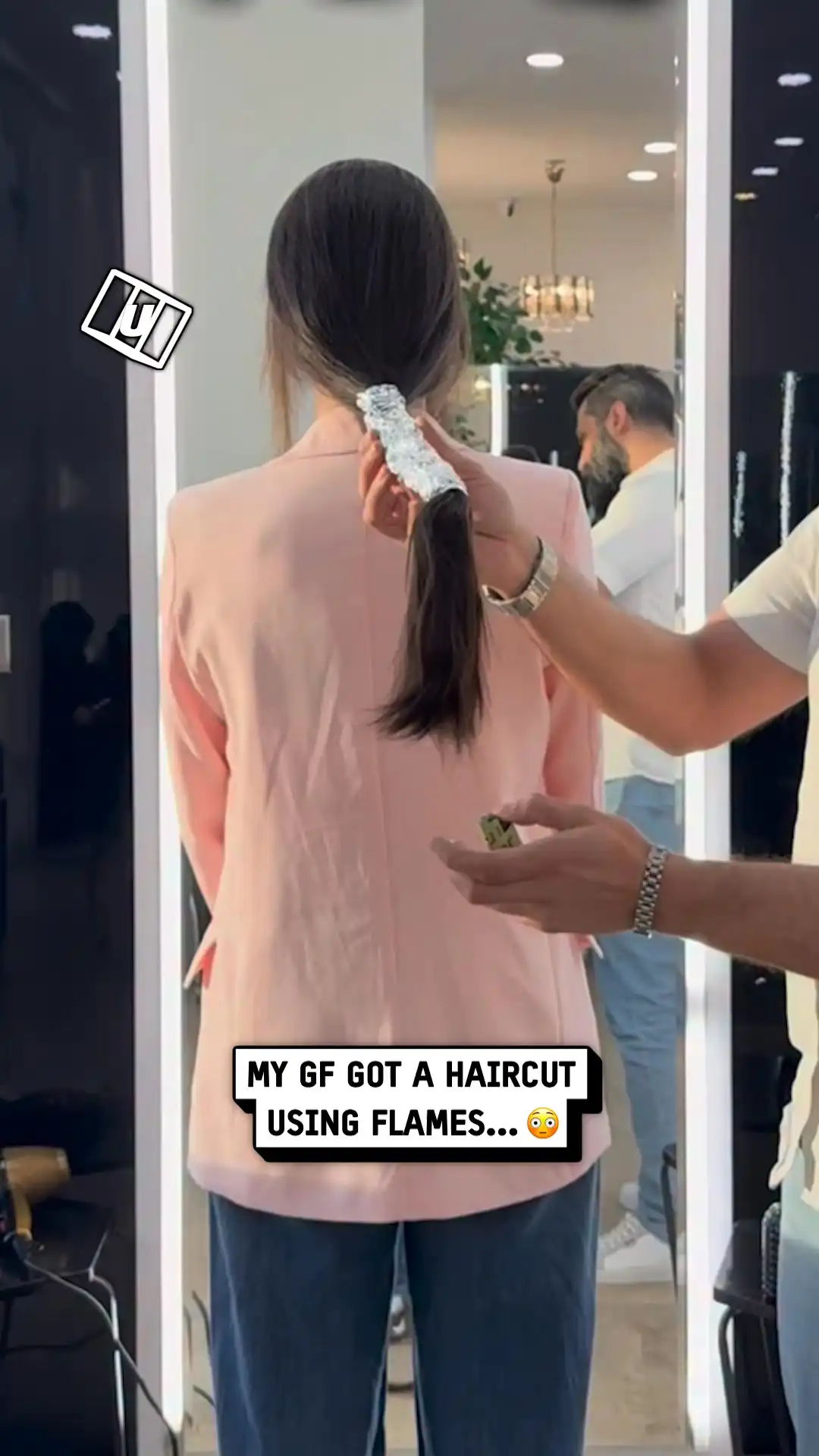 Haircut goes up in flames 😳🔥