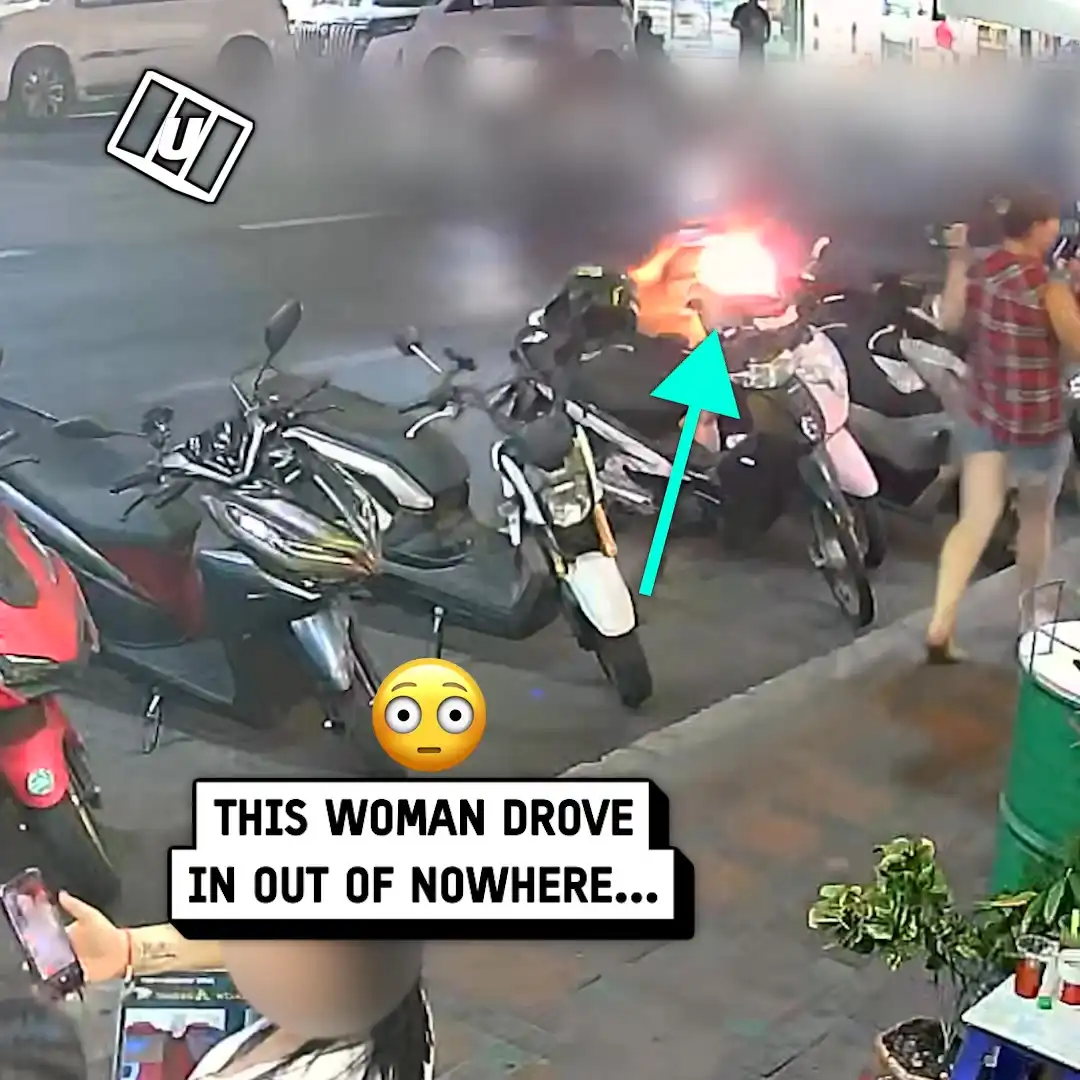 Woman pulls bike over as it goes up in flames 😳🔥