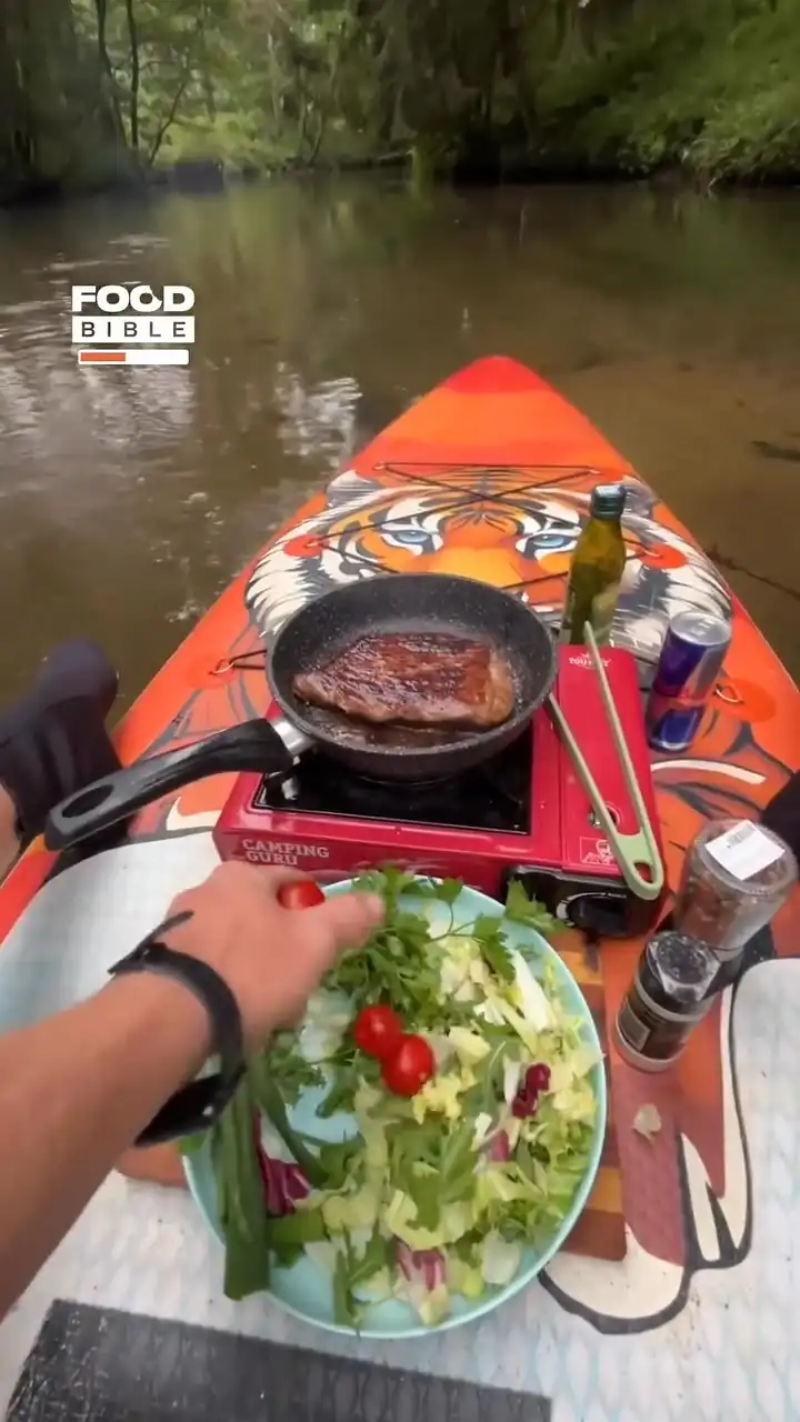Cooking steak on a paddleboard π₯©