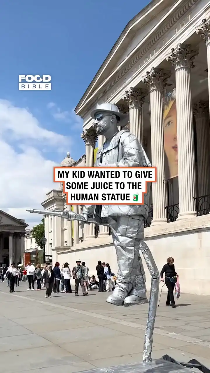 Kid offers juice to Silverman statue 😯