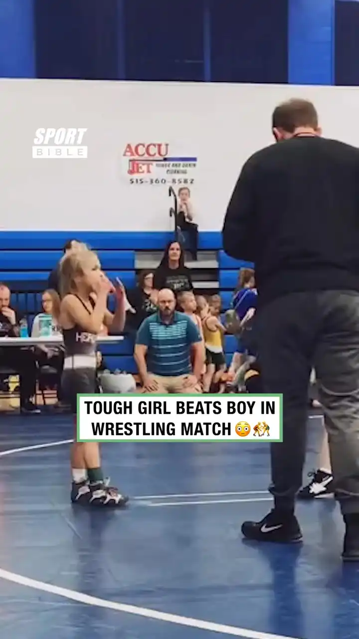 Girl Beats Boy In Wrestling Match