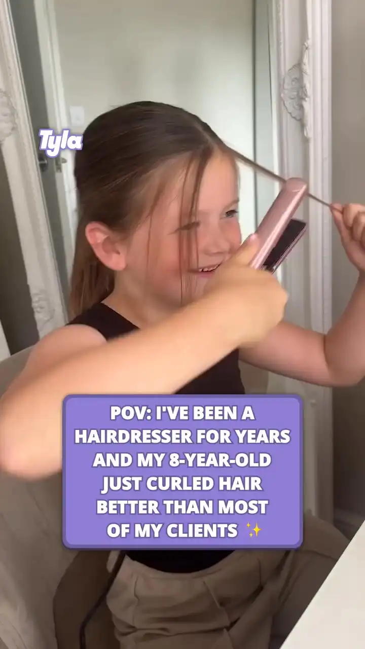 8 year old is pro at curling hair 😲