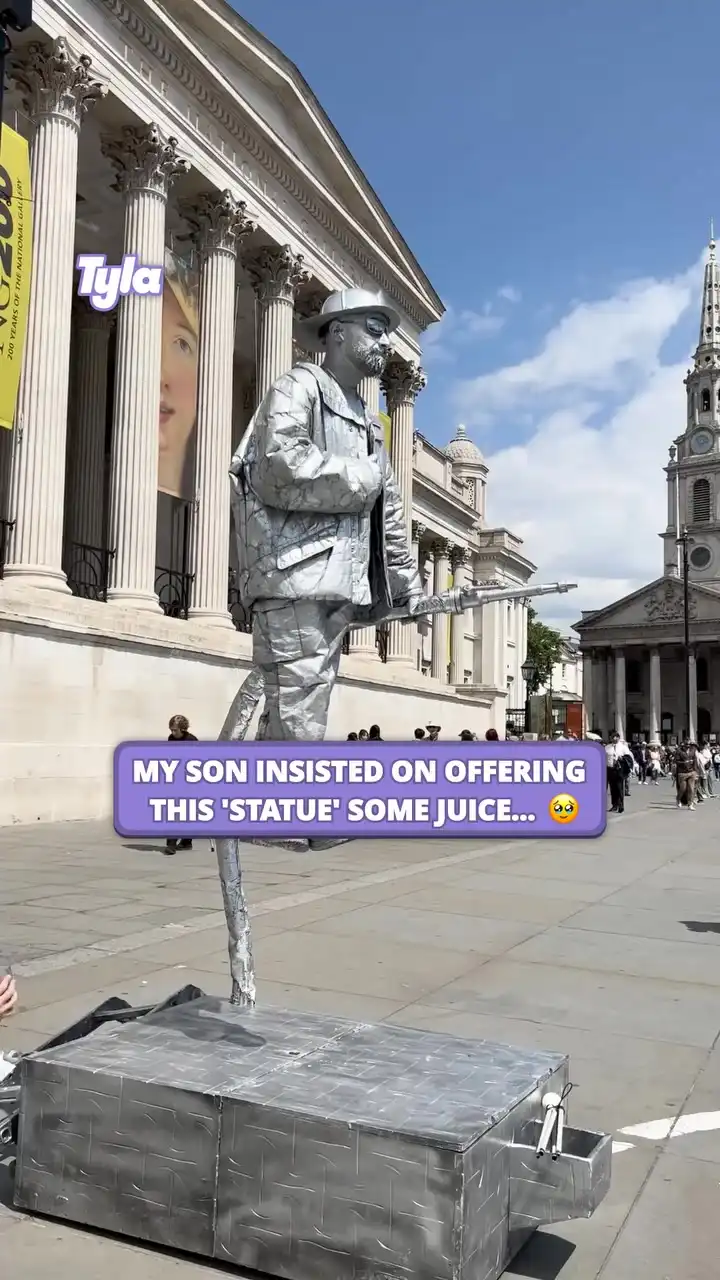 Kid offers juice to Silverman statue 😯