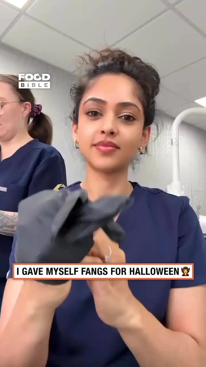 Dentist gives herself fangs π§