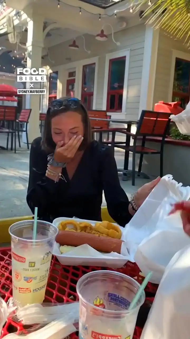 Girl opens her food box and has a massive hotdog 🌭