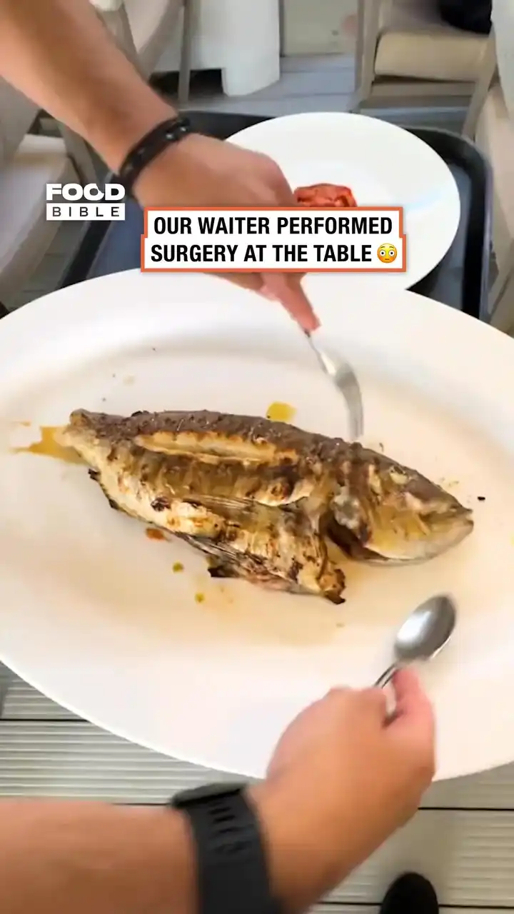 Fish surgery at the table 😳