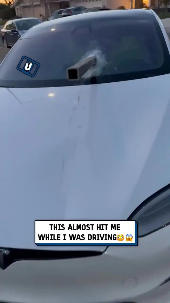 Car window impaled by metal rod ππ±