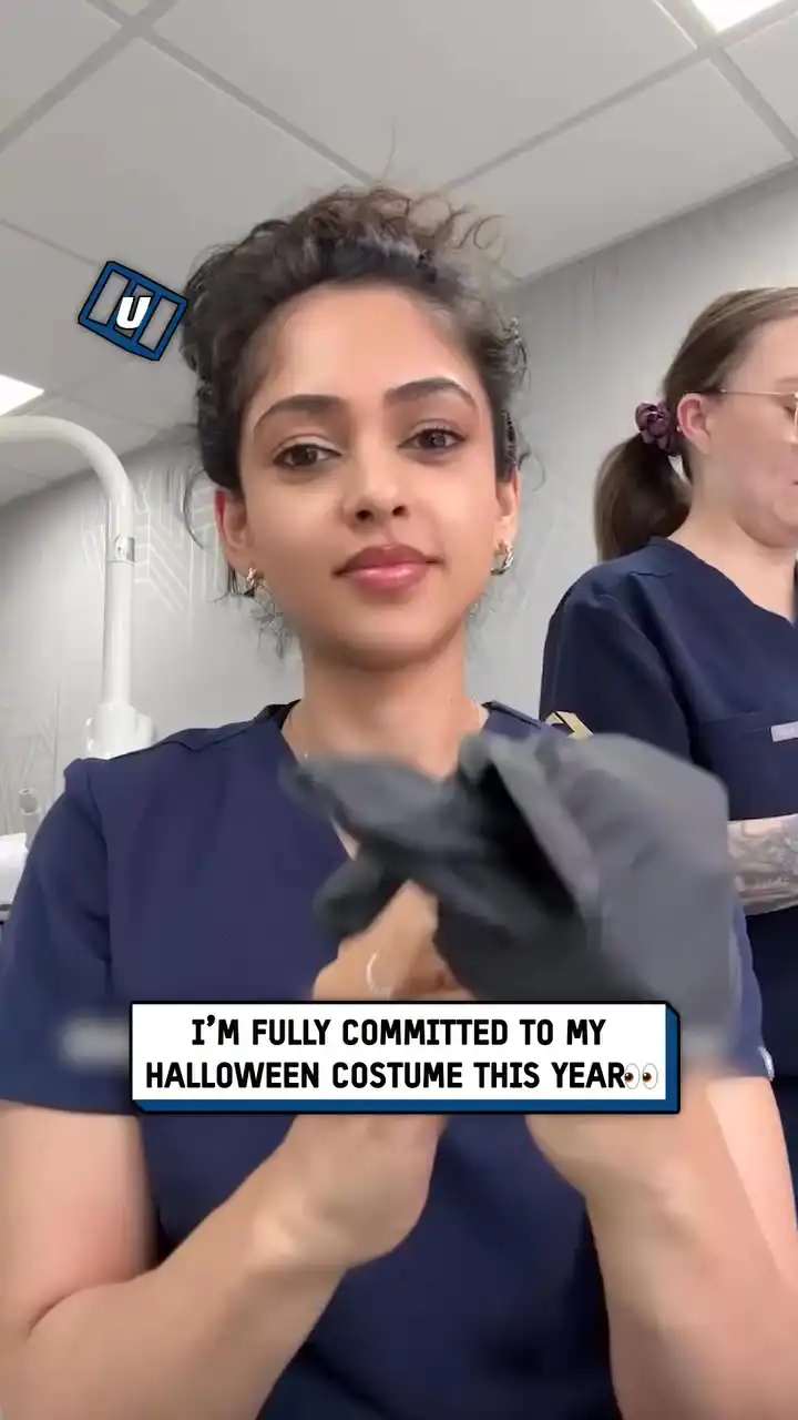 Dentist gives herself fangs π§ββοΈπ¦·