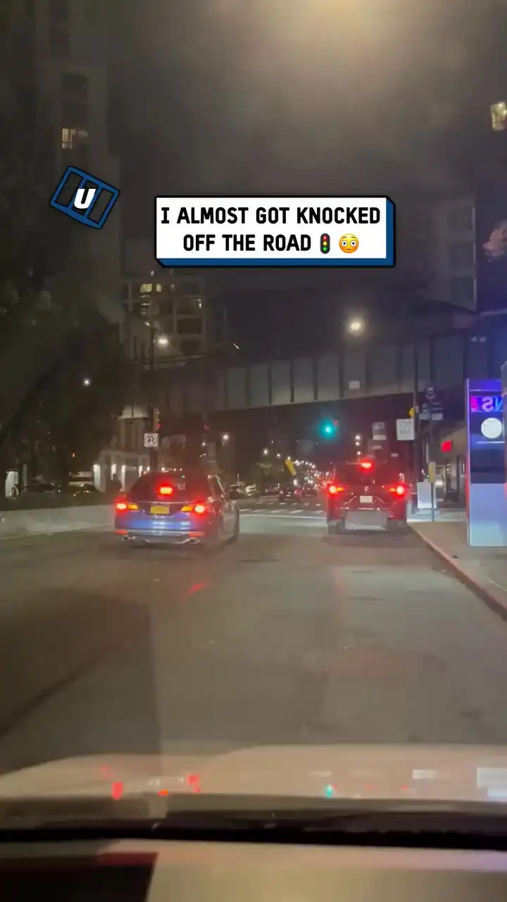 Cars evade swinging traffic light 🚦😱