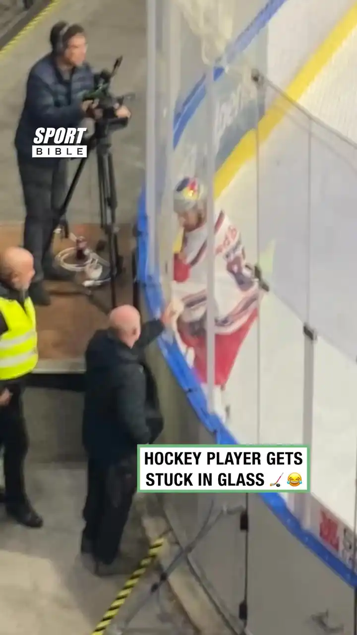 Hockey Player Gets Stuck In Glass