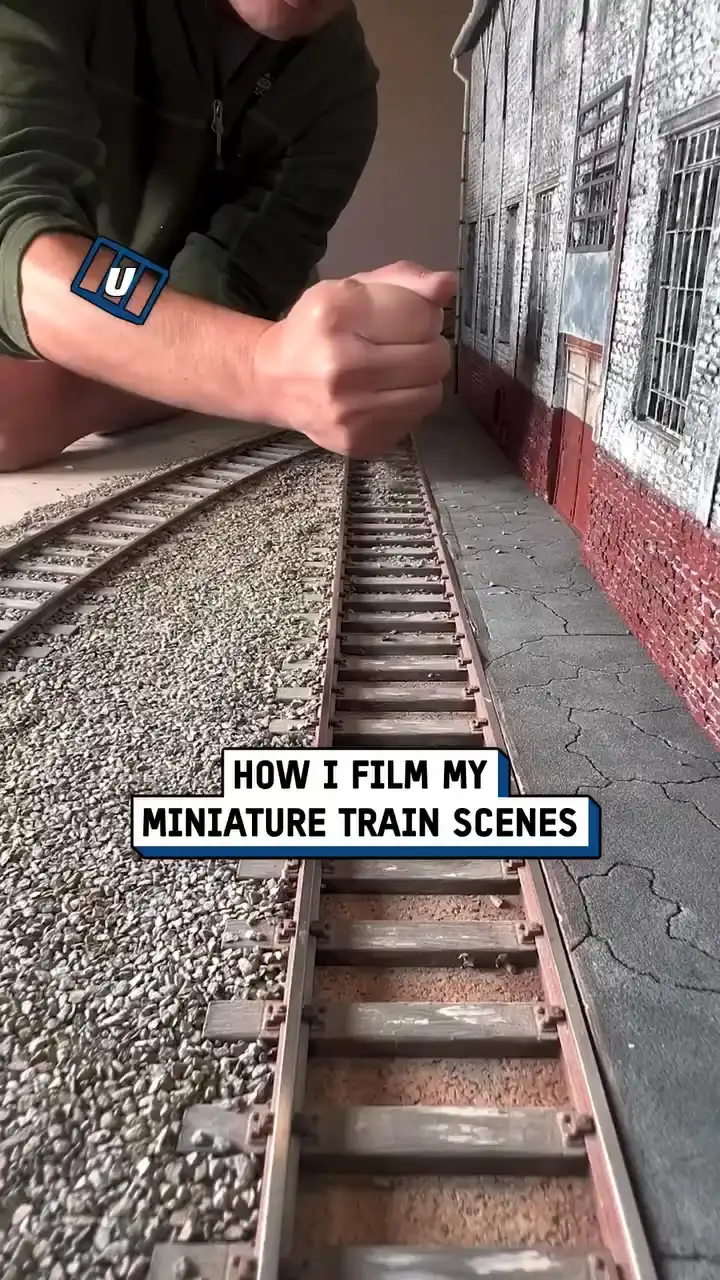 Filming miniature model train scenes 🚂