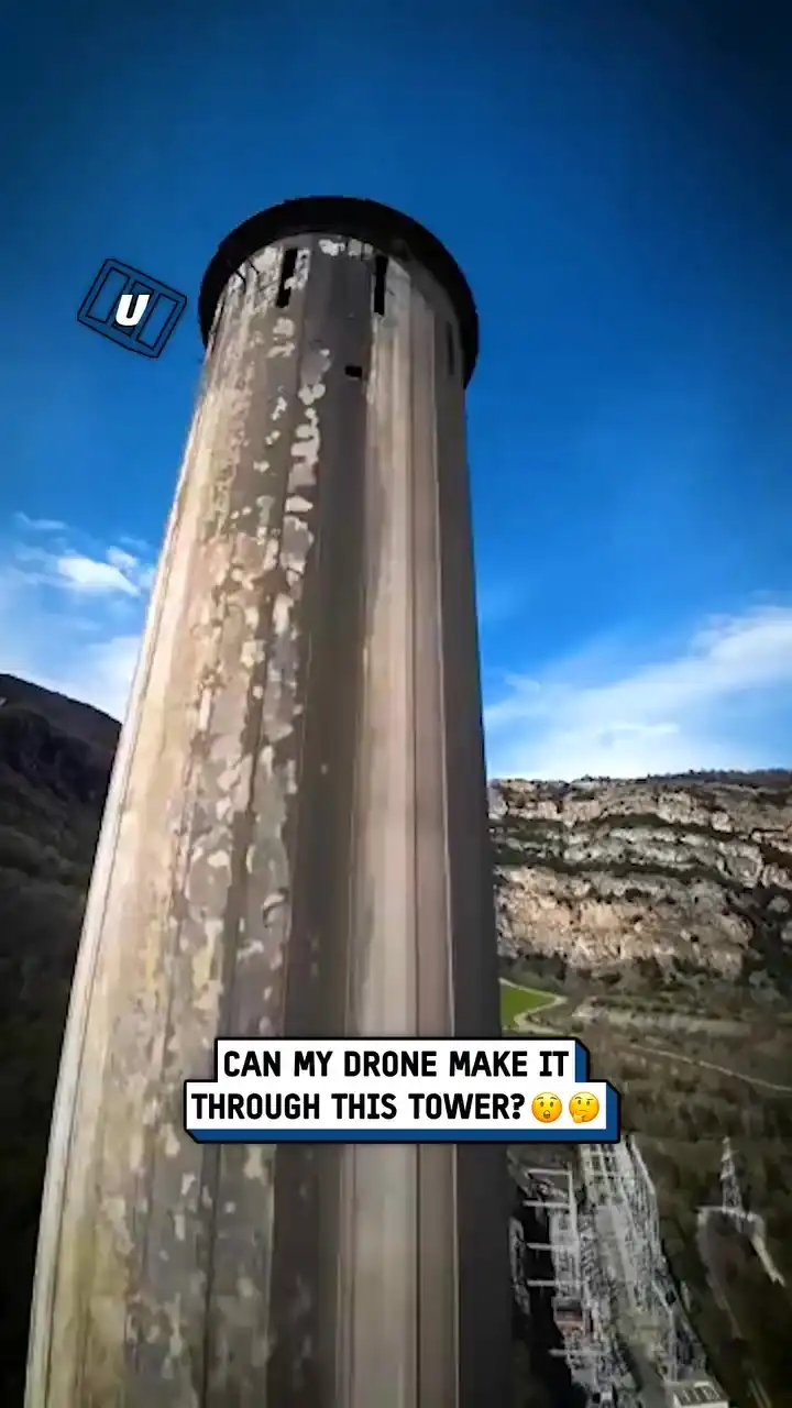 Flying drone through a thin tower 🤯😲