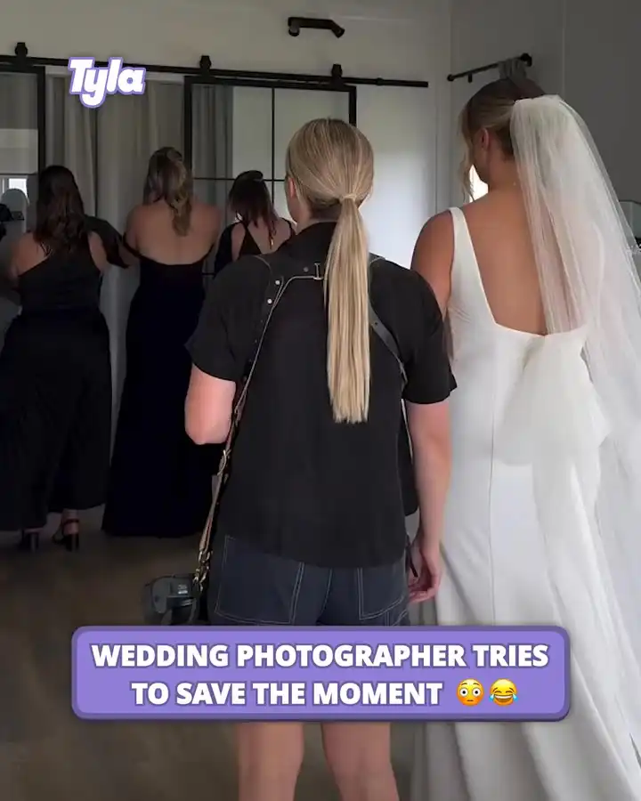 Wedding photographer tries to save the moment 😂
