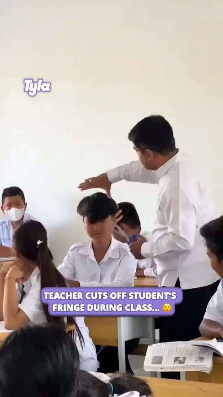 Teacher cuts off student's hair during class 😳