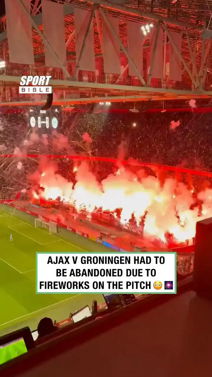 Ajax v Groningen Abandoned After Fireworks On Pitch