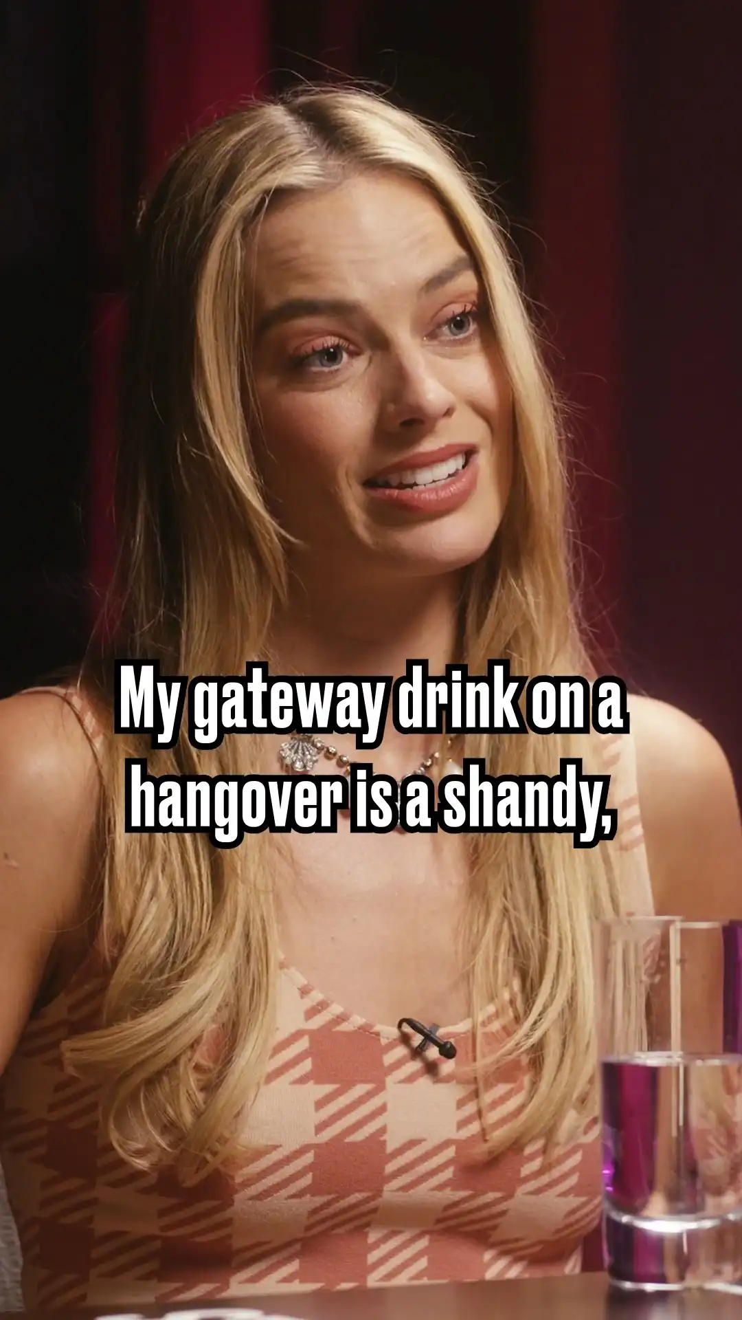 Margot Robbie explains a shandy to America Ferrerra