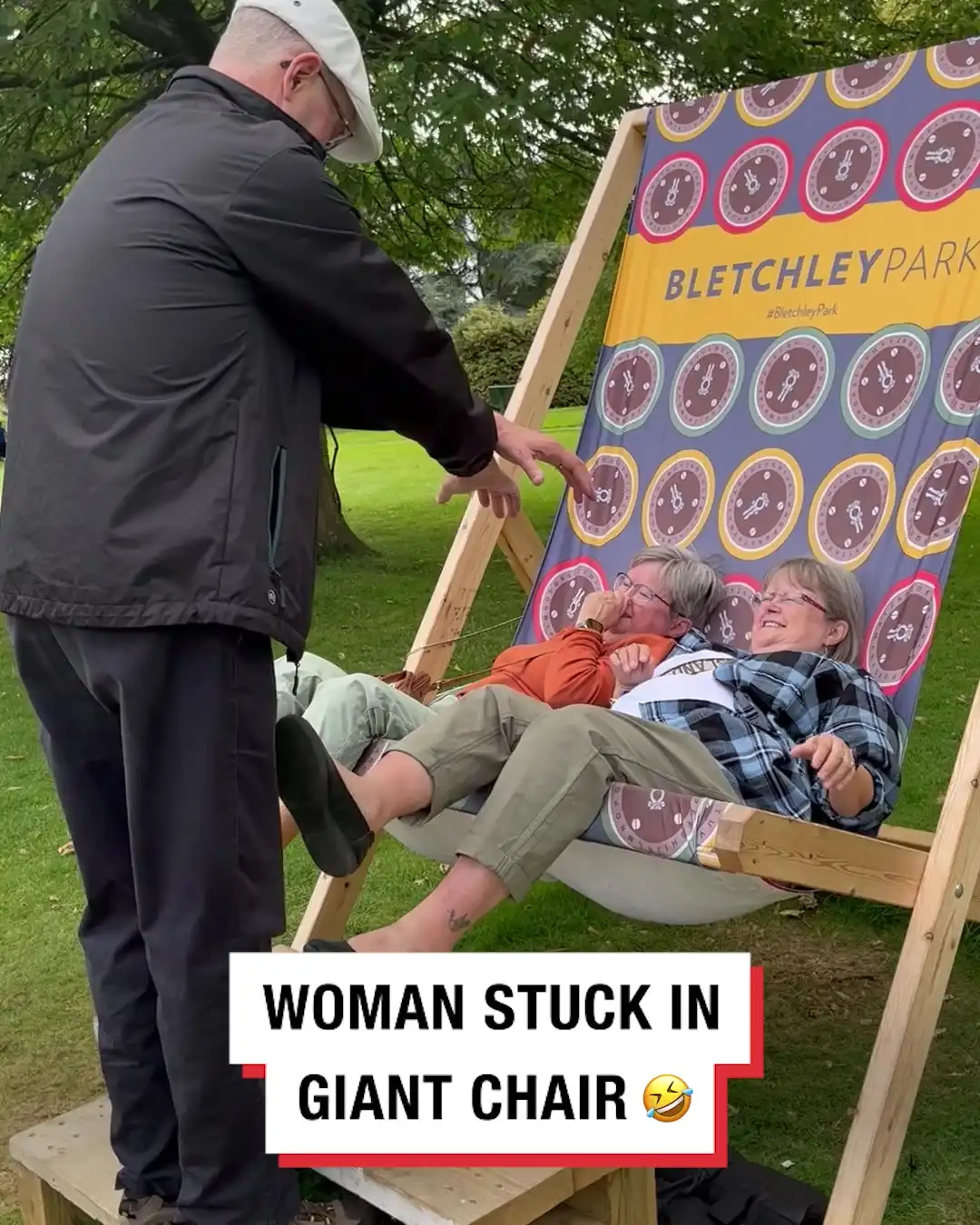 Women stuck in giant chair