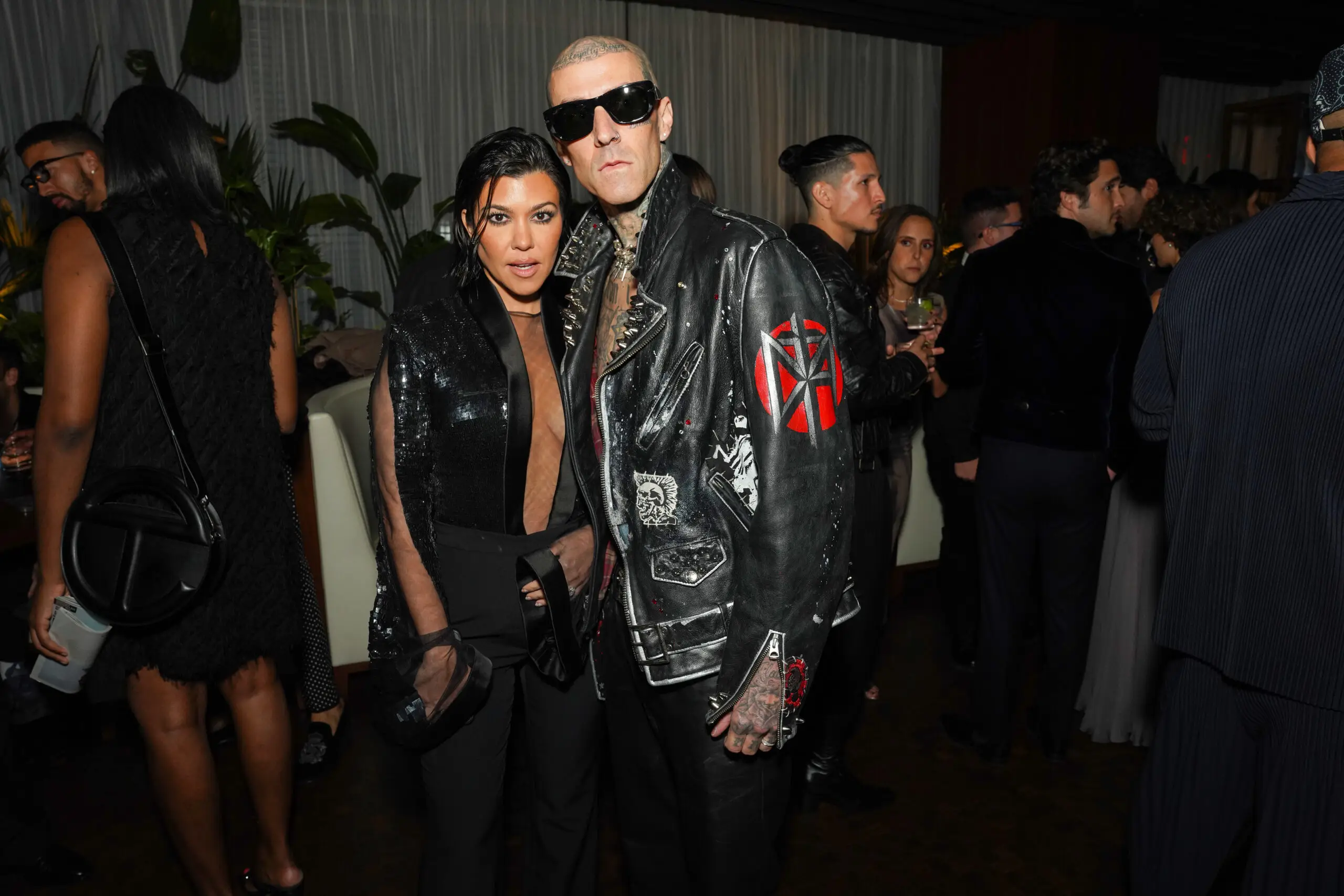 Kourtney Kardashian Barker and Travis Barker attend the GQ Men of the Year Party 2022 at The West Hollywood EDITION in West Hollywood, California. 