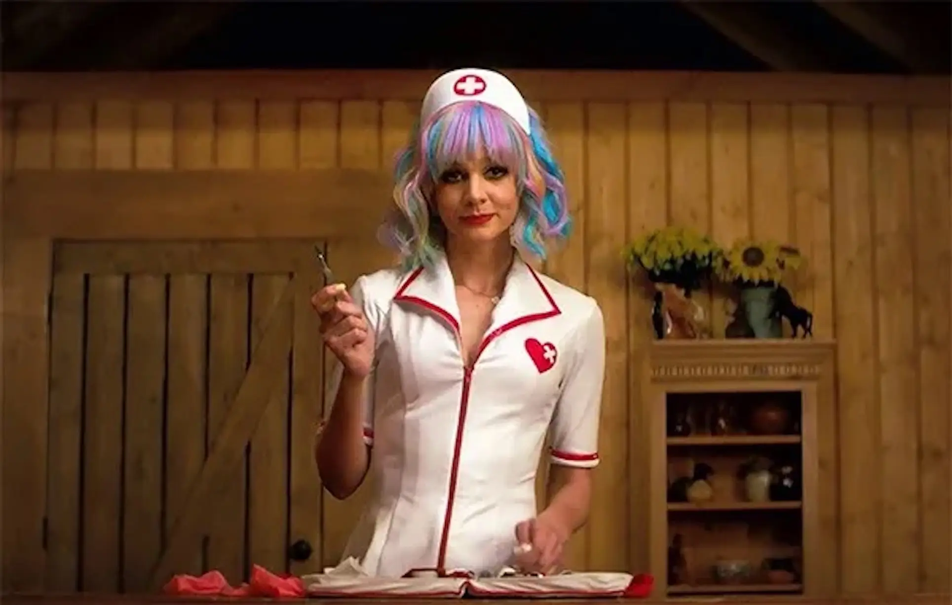 Cassandra Thomas pretending to be a stripper, pretending to be a nurse in "Promising Young Woman."
