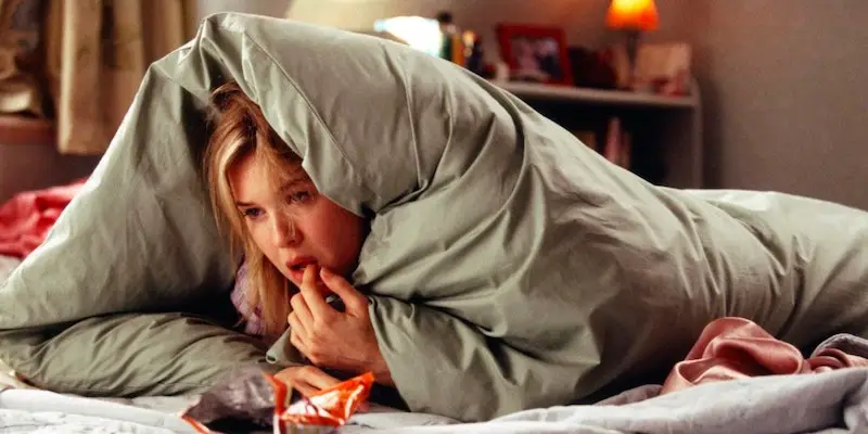 bridget jones curled up in a blanket burrito