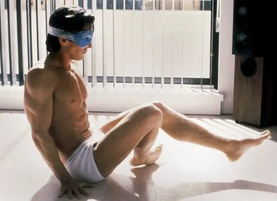 "American Psycho" Patrick Bateman exercising in an eye mask