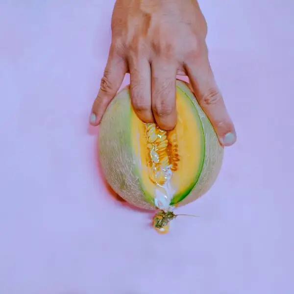 fingers on melon