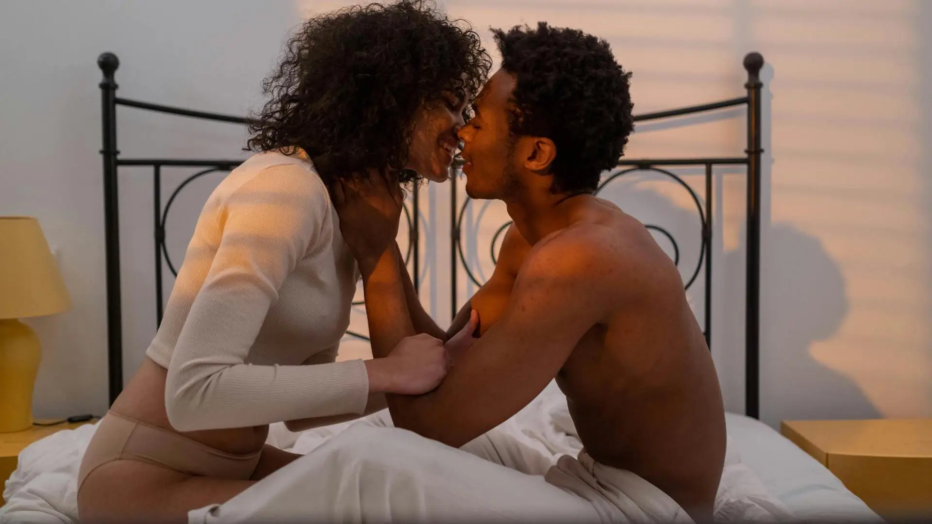 couple in bed doing dirty talk