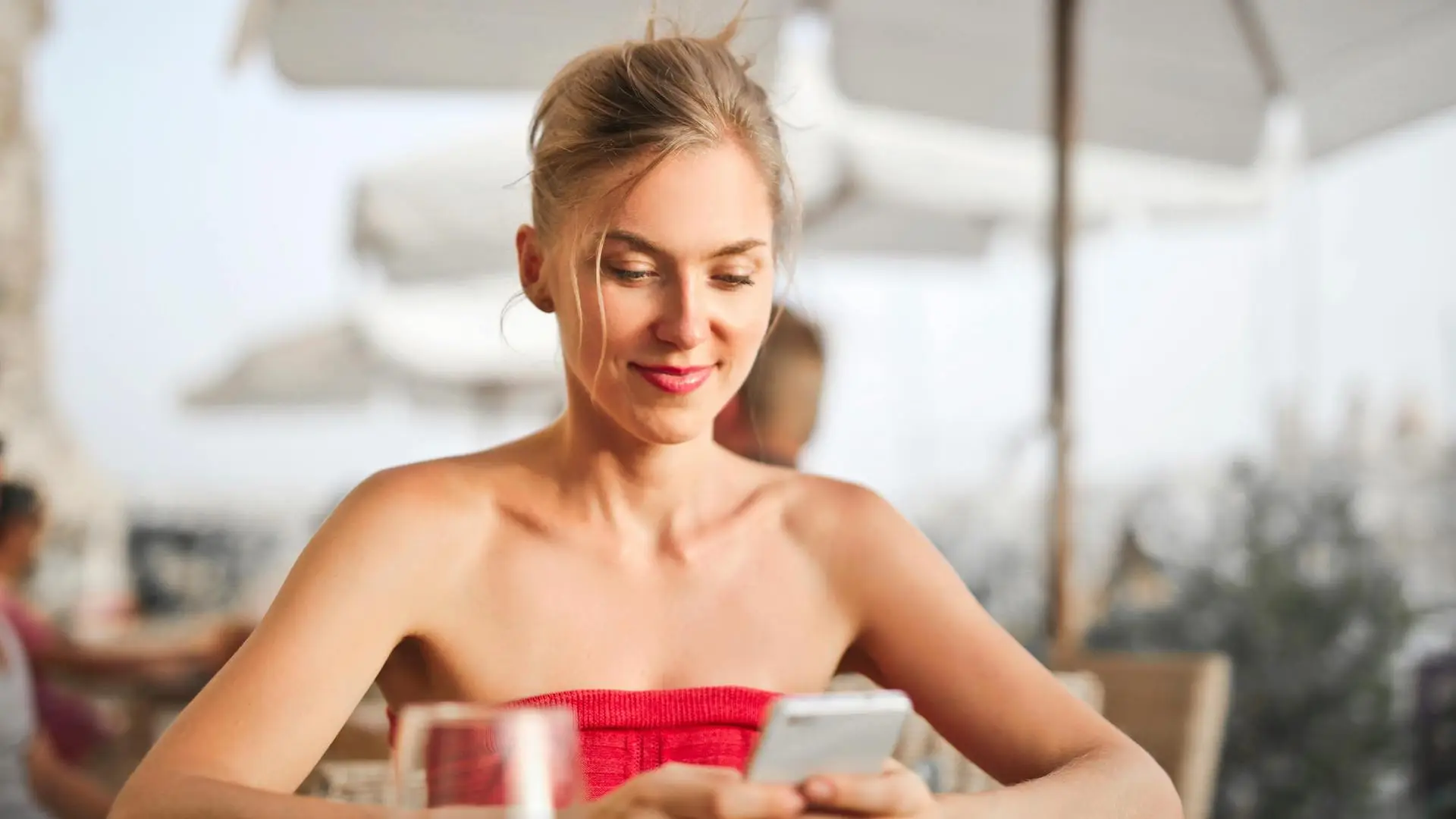 woman looking at phone