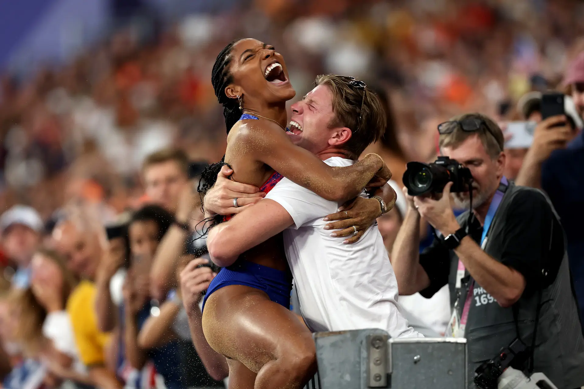 PARIS, FRANCE - AUGUST 08: Tara Davis-Woodhall of Team United States celebrates winning the gold medal after competing in the Women's Long Jump Final on day thirteen of the Olympic Games Paris 2024 at Stade de France on August 08, 2024 in Paris, France. (Photo by Patrick Smith/Getty Images)