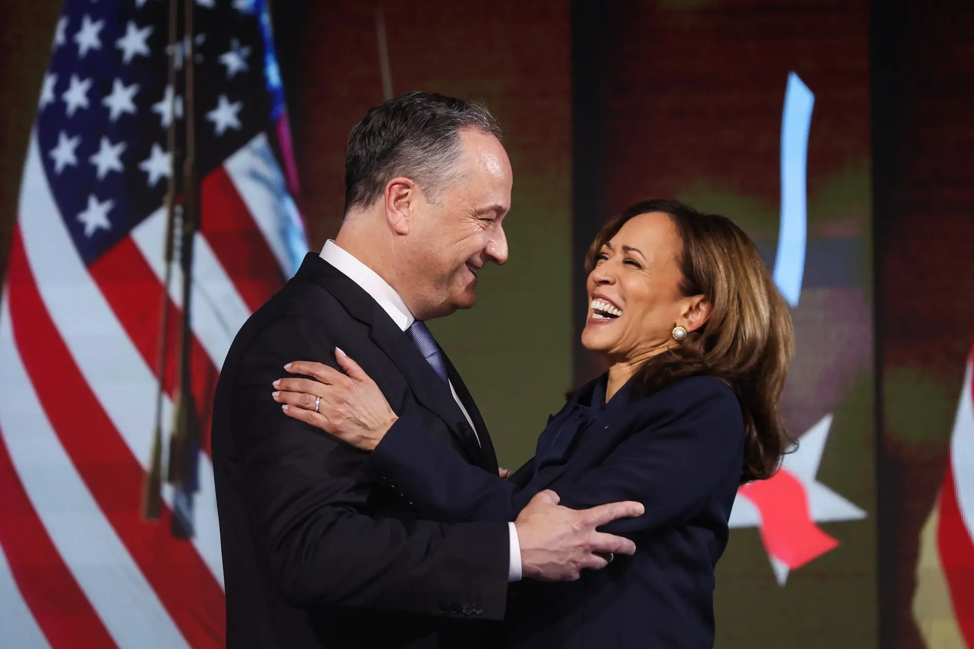 CHICAGO, ILLINOIS - AUGUST 22: Second Gentleman Doug Emhoff and Democratic presidential nominee, U.S. Vice President Kamala Harris celebrate after she accepted the Democratic presidential nomination during the final day of the Democratic National Convention at the United Center on August 22, 2024 in Chicago, Illinois. Delegates, politicians, and Democratic Party supporters are gathering in Chicago, as current Vice President Kamala Harris is named her party's presidential nominee. The DNC takes place from August 19-22. (Photo by Justin Sullivan/Getty Images)