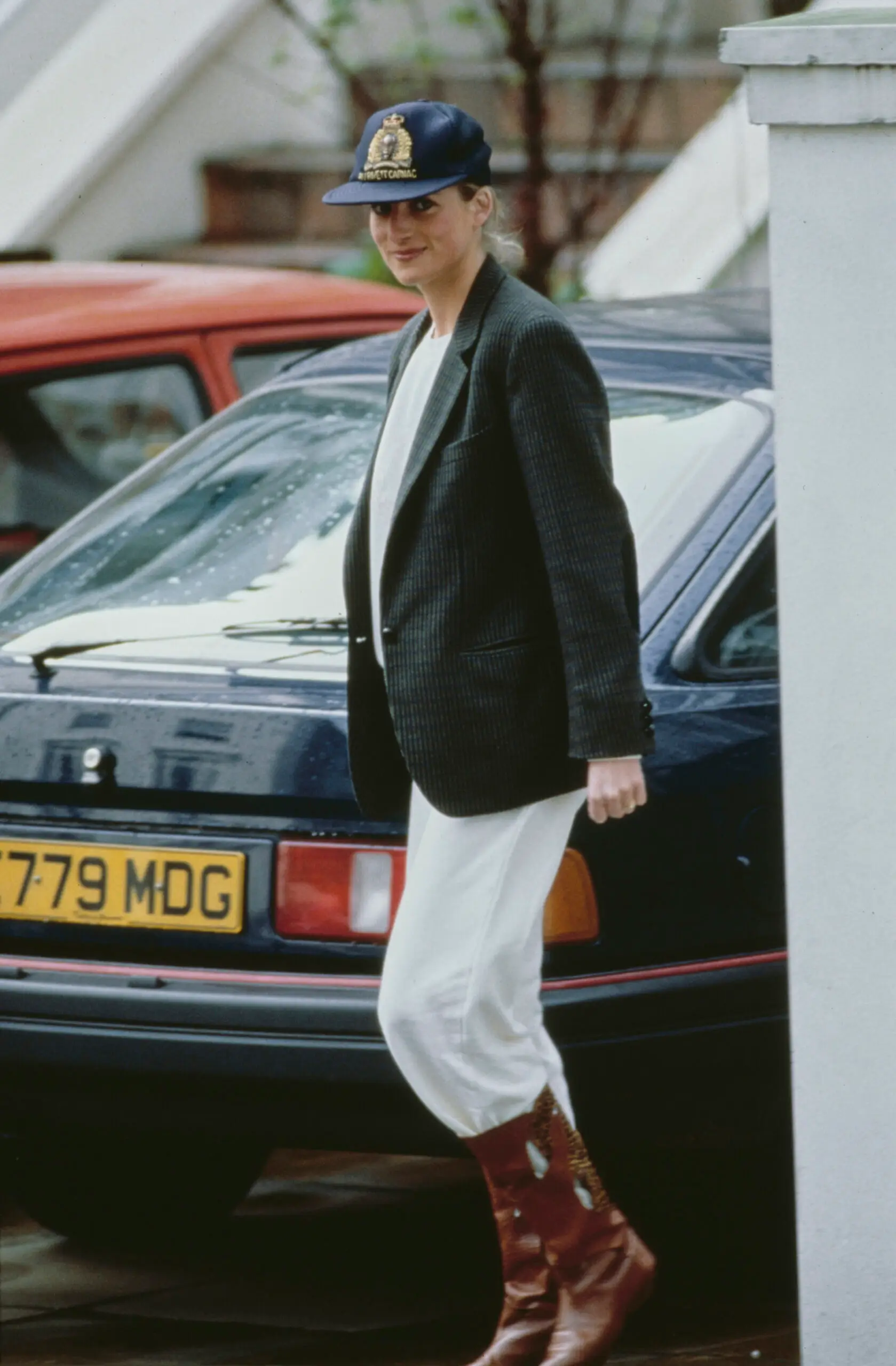 British Royal Diana, Princess of Wales (1961-1997), wearing a tweed jacket with white trousers tucked into riding boots, and a baseball cap, after taking her sons to Wetherby School in Notting Hill, London, England, 25th April 1989. (Photo by Tim Graham Photo Library via Getty Images)
