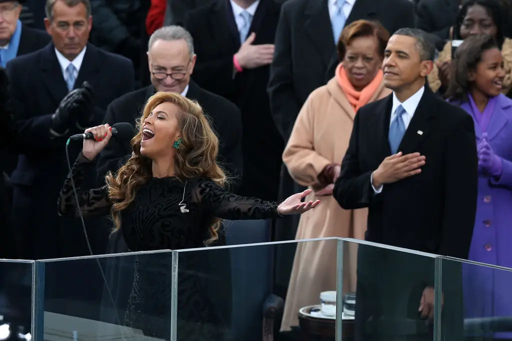 Beyoncé performs the national anthem as U.S. President Barack Obama