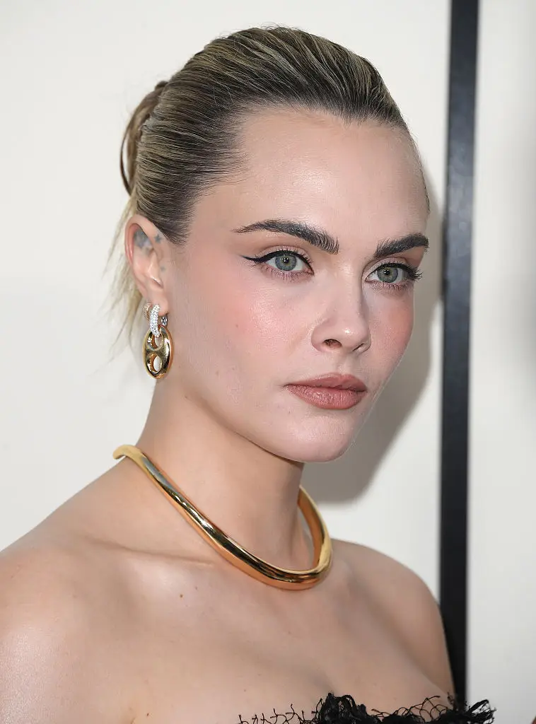 Cara Delvigne Aimee Lou Wood support