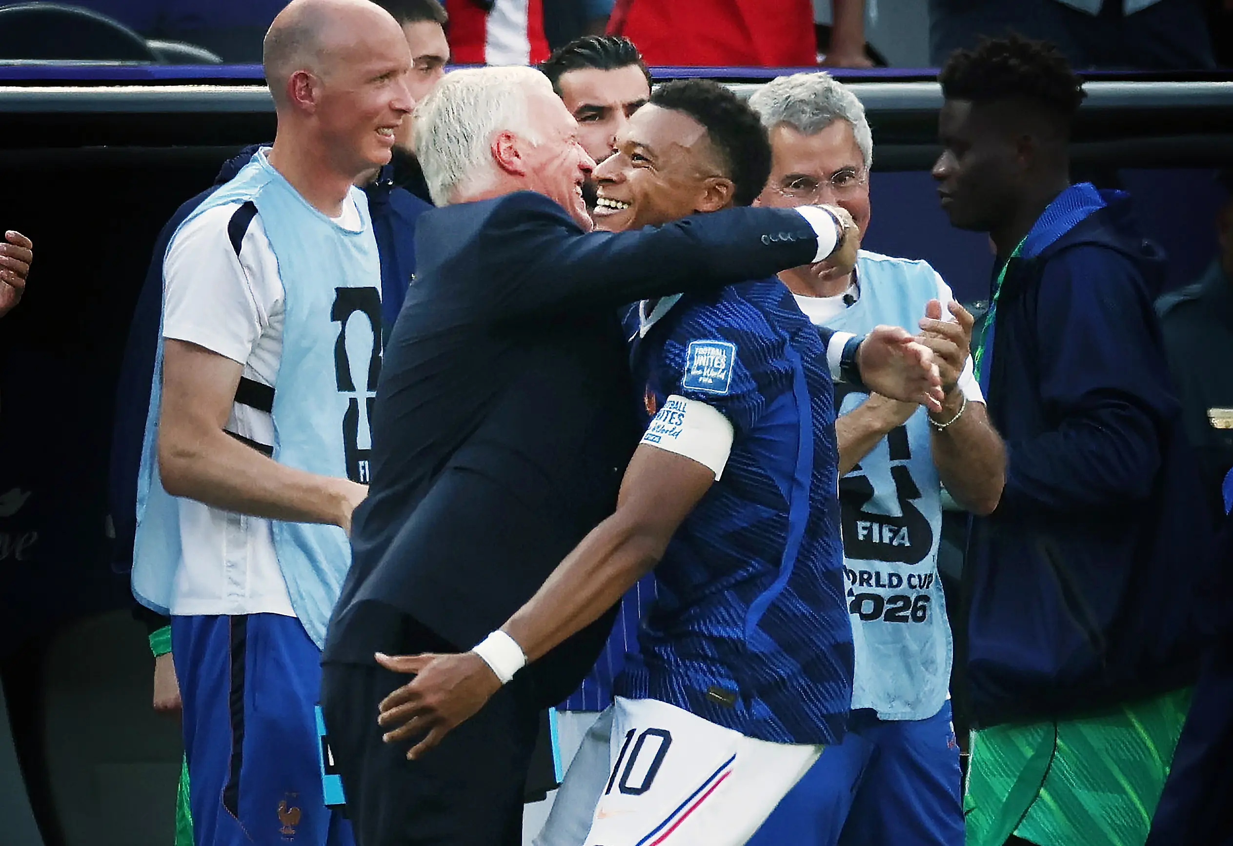 Kylian Mbappe celebrates with Didier Deschamps. Image credit: Getty