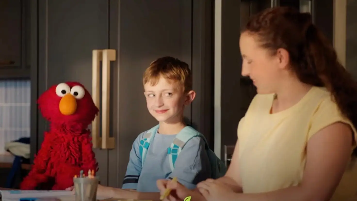 A nine-year-old with 'prune belly syndrome' is starring alongside Elmo in a video to raise awareness of tube feeding (YouTube/Compleat)
