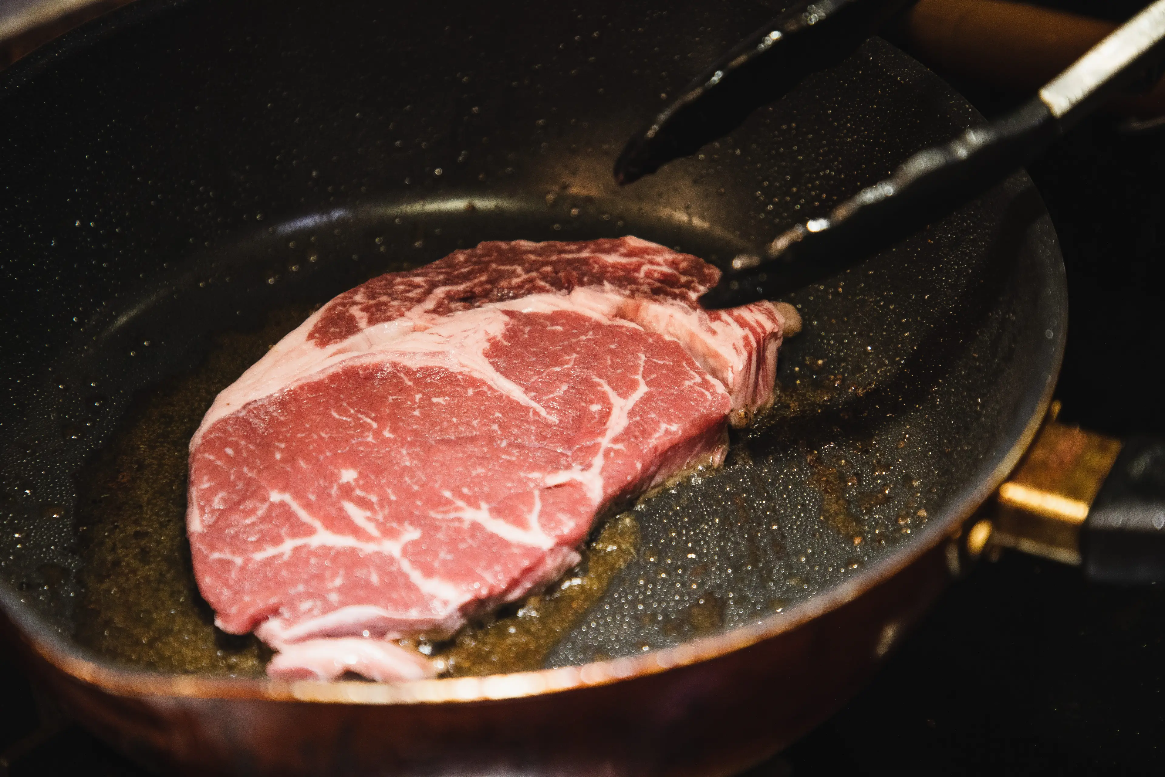 The star's steak cooking method has divided social media users (Getty Stock Image)