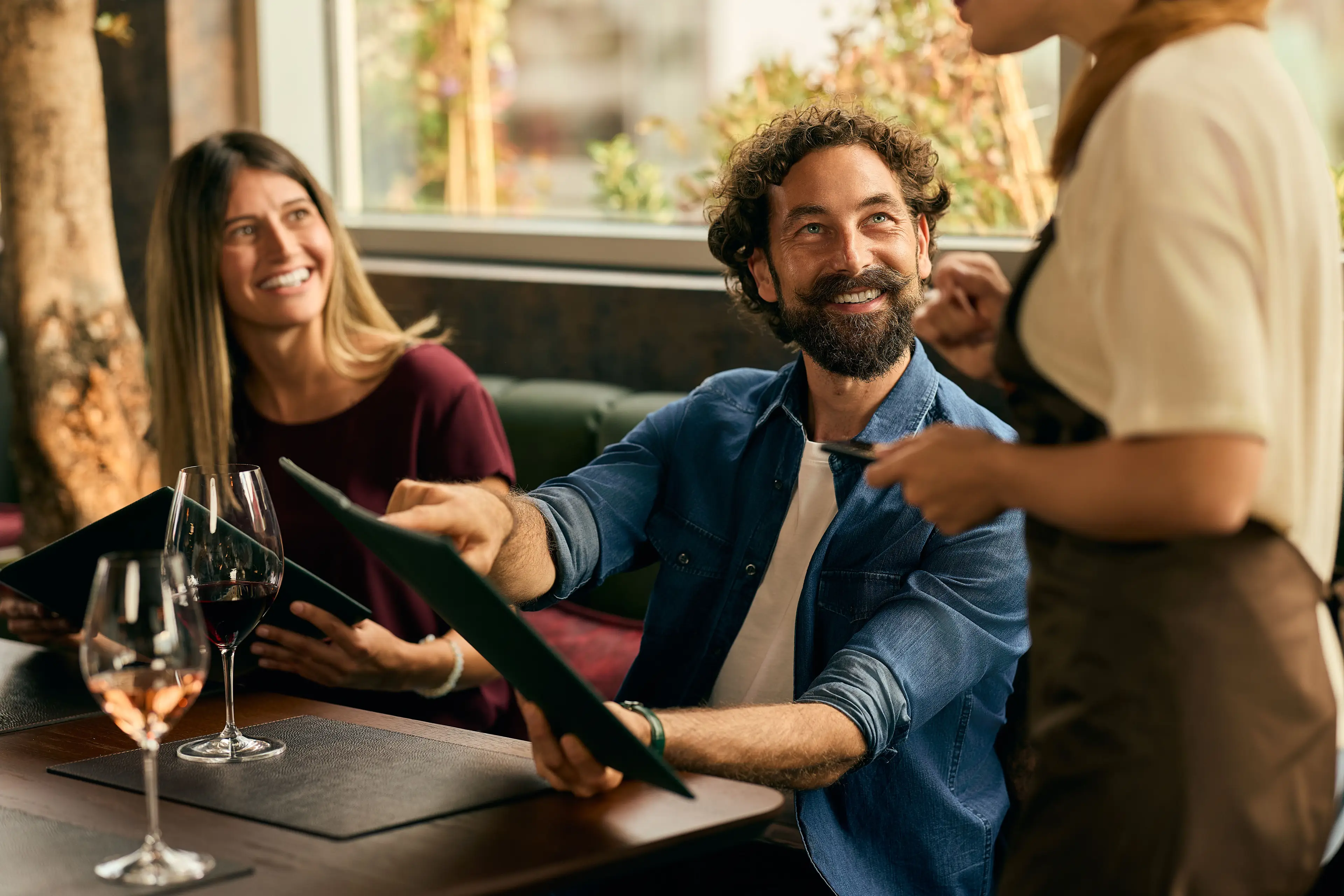 A drinks expert explained that you can easily avoid 'pronunciation tax' when ordering wine (Getty Stock Image)