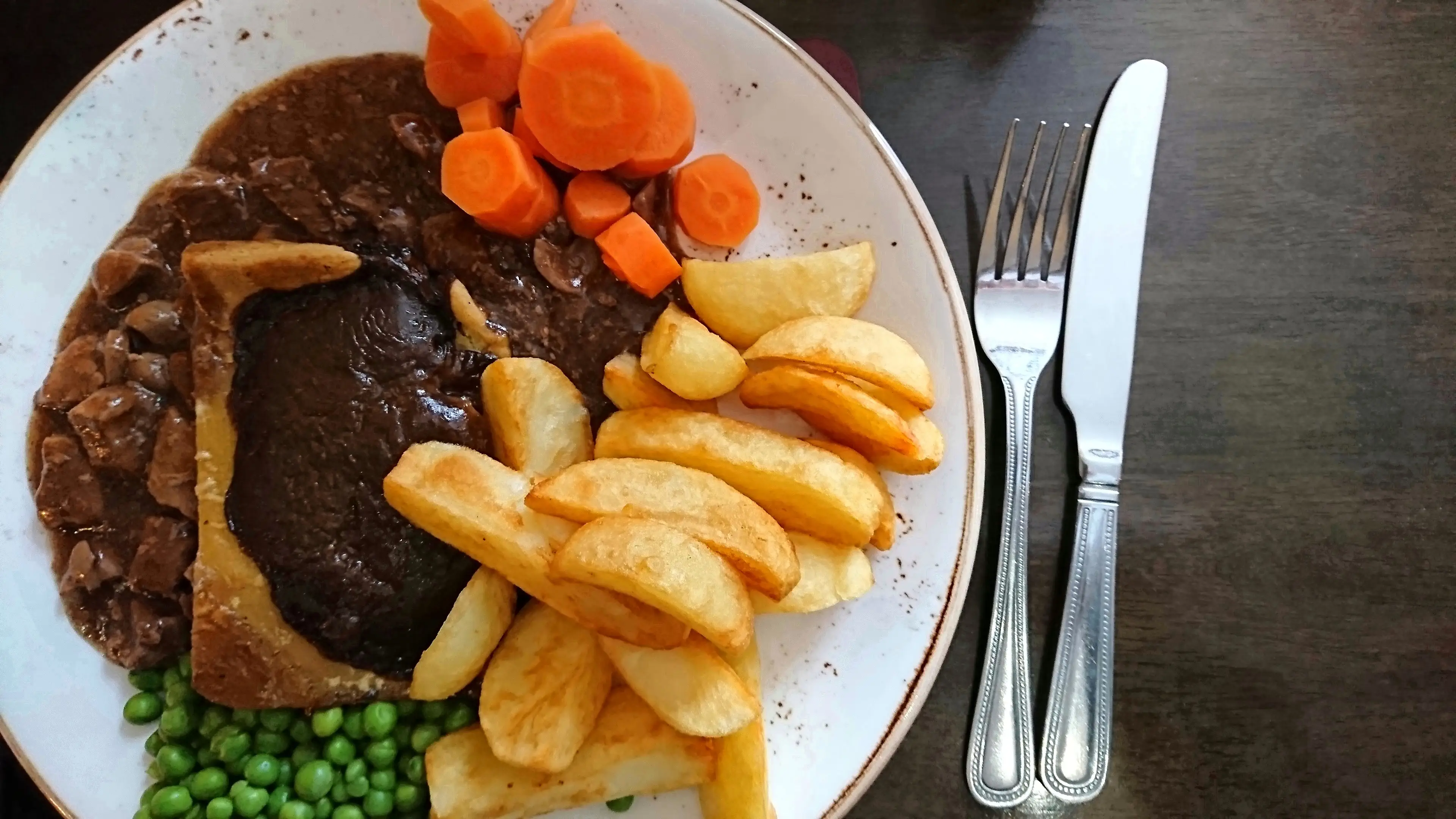 Menu records showed he had selected chicken paella that evening, but was served steak pie instead (Elva Etienne/Getty Images)