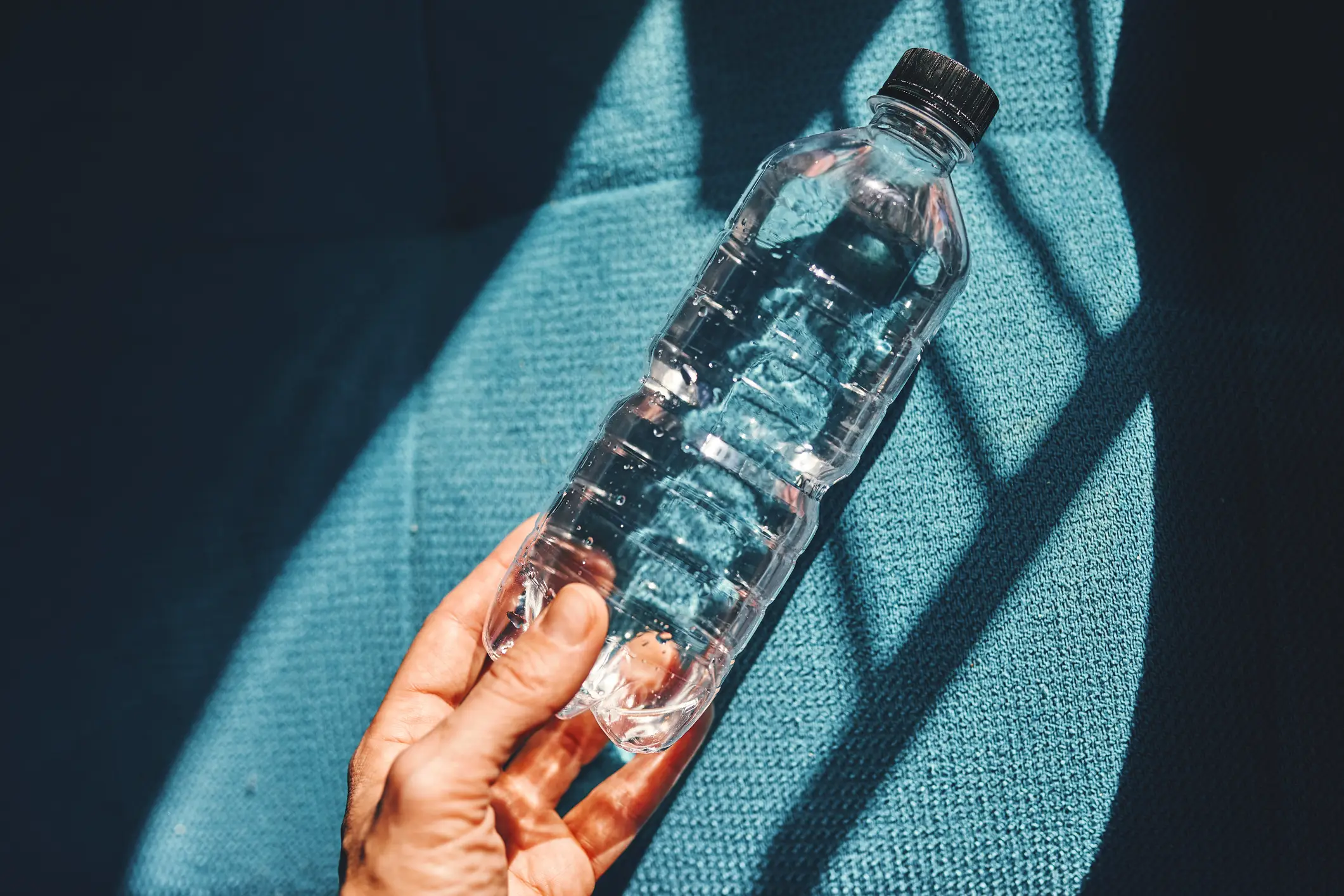 Plastic-bottled water may contain as many as 240,000 microscopic plastic particles (Ekaterina Goncharova/Getty Images)