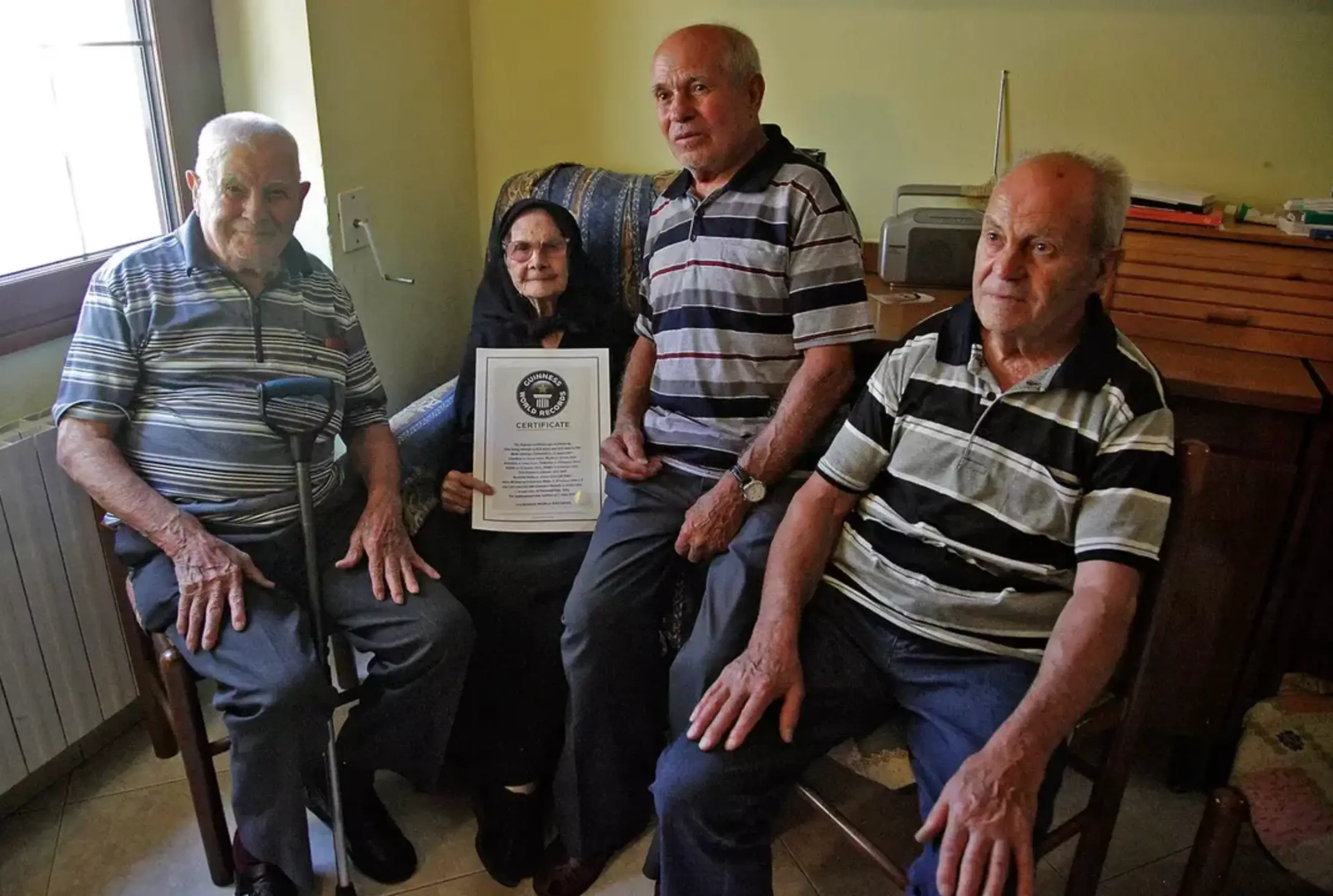 The Melis family were named the 'world's oldest family' in 2012 after they were found to have a combined age of 818 (ETTORE LOI/AFP/GettyImages)