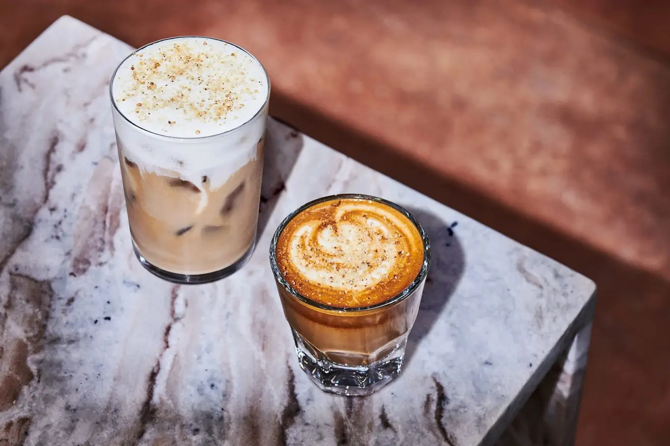 The Pecan Oatmilk Crunch Latte (left) and the Pecan Oatmilk Cortado (right) have entered the fray (Starbucks)
