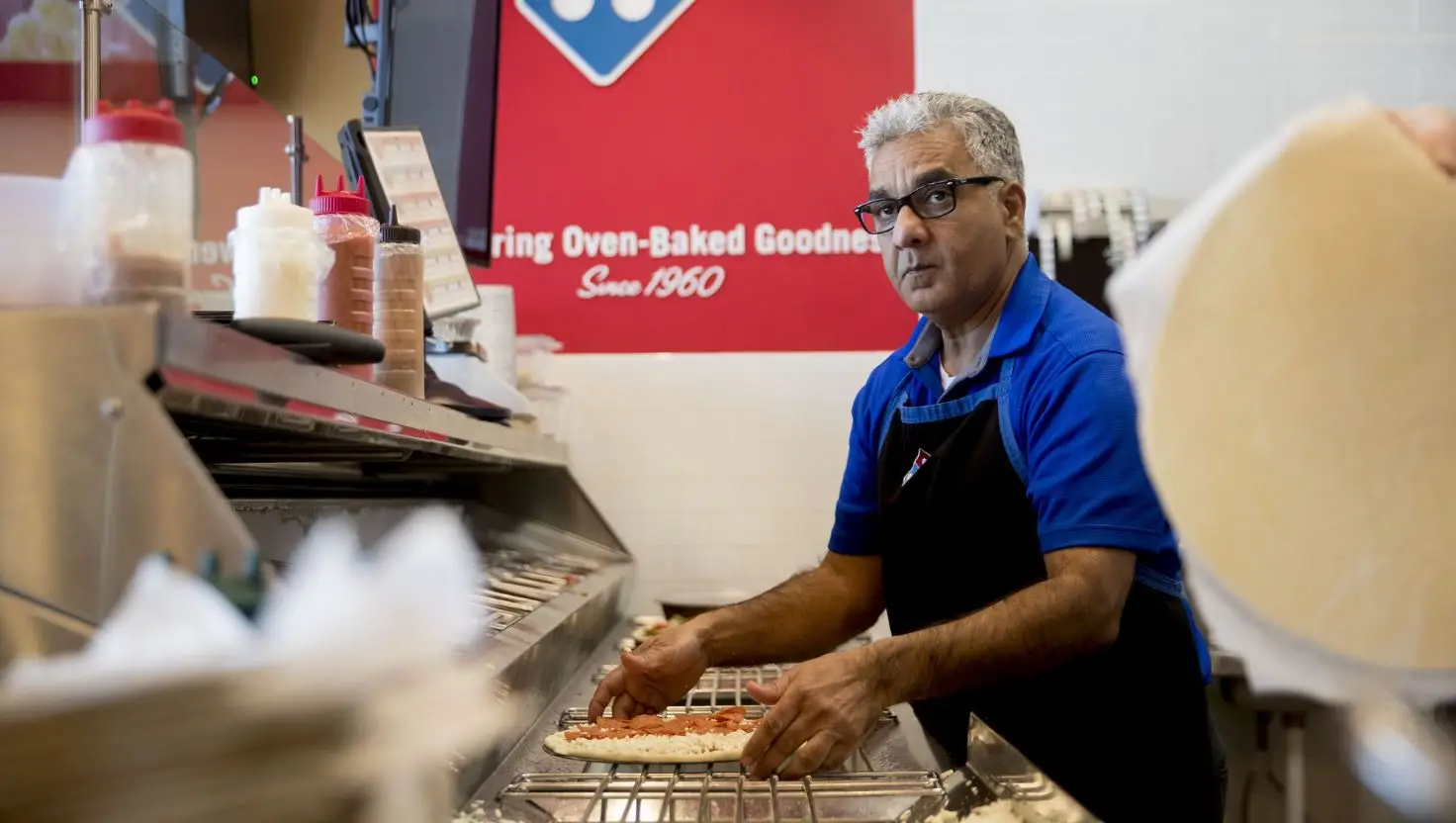 Staff also don't have to wear hair nets, according to the company (Andrew Harrer/Bloomberg via Getty Images)