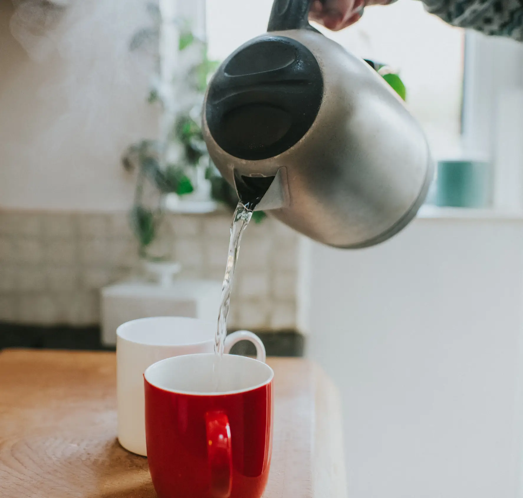 Top up your coffee with hot water once the granules have dissolved in cold water (Catherine Falls Commercial/Getty Images)