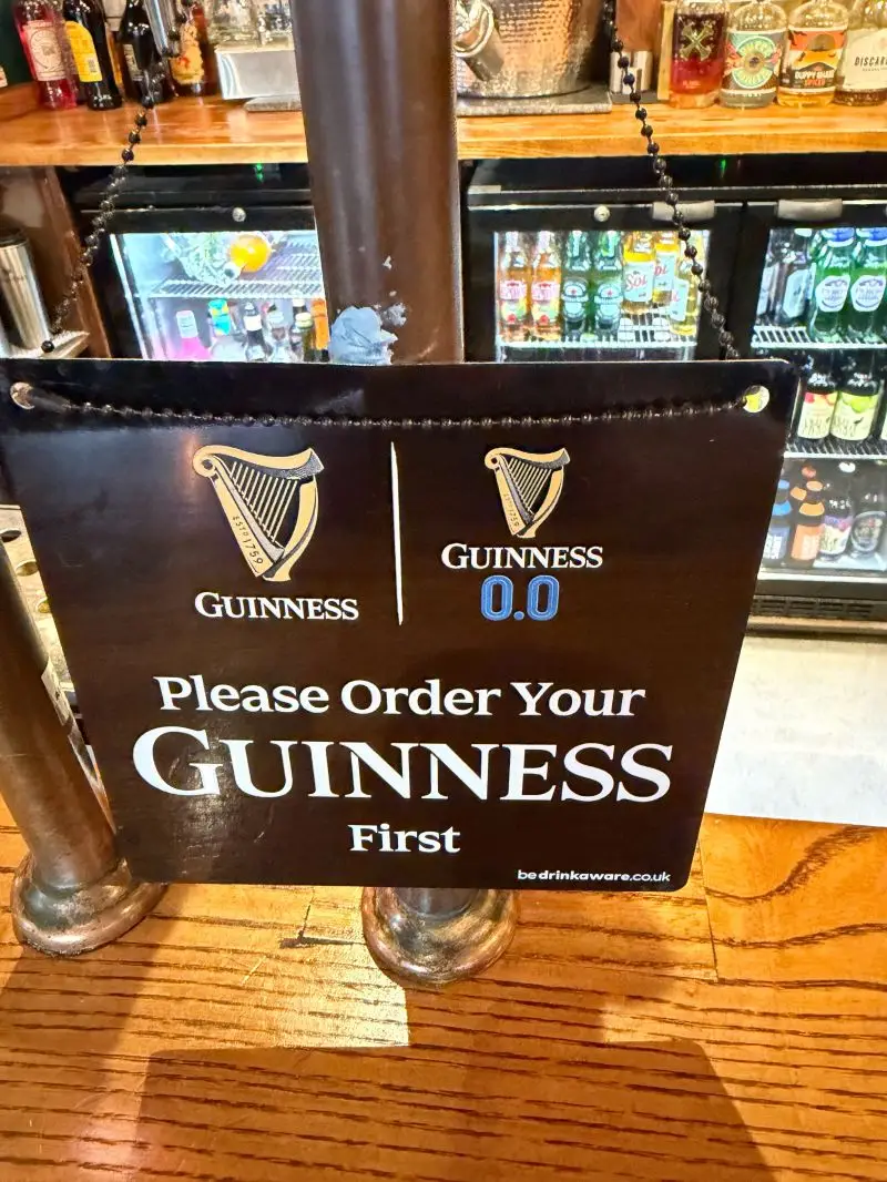 A bar sign instructing customers on how to order the drink has been debated online (Daniel Cornwell/LinkedIn)